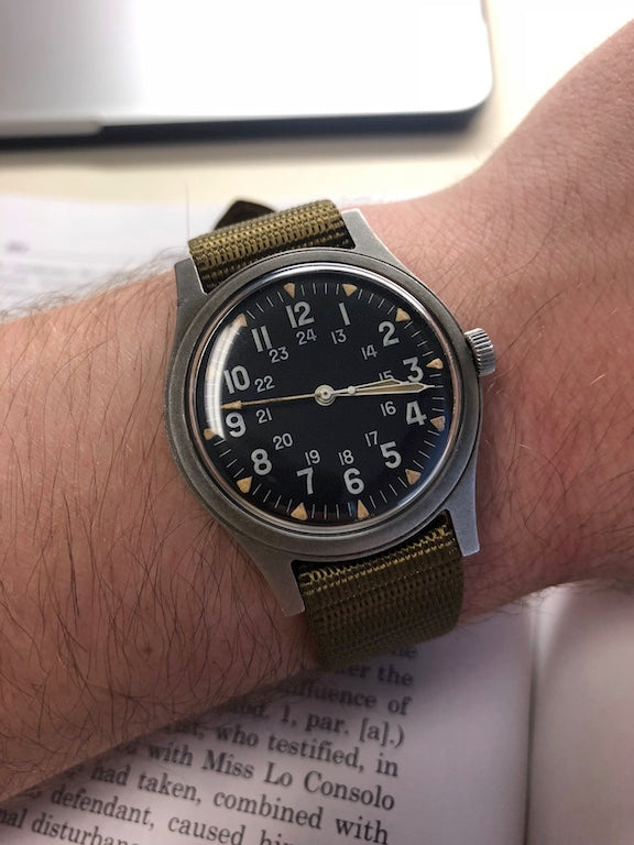 GG-W-113 U.S 1960s Pattern Automatic Military Watch 100m Water Resistant with Shatter and Scratch Resistant Sapphire Box Crystal on Matching Retro Stainless Steel "Bonklip" Bracelet with an Additional Webbing Strap